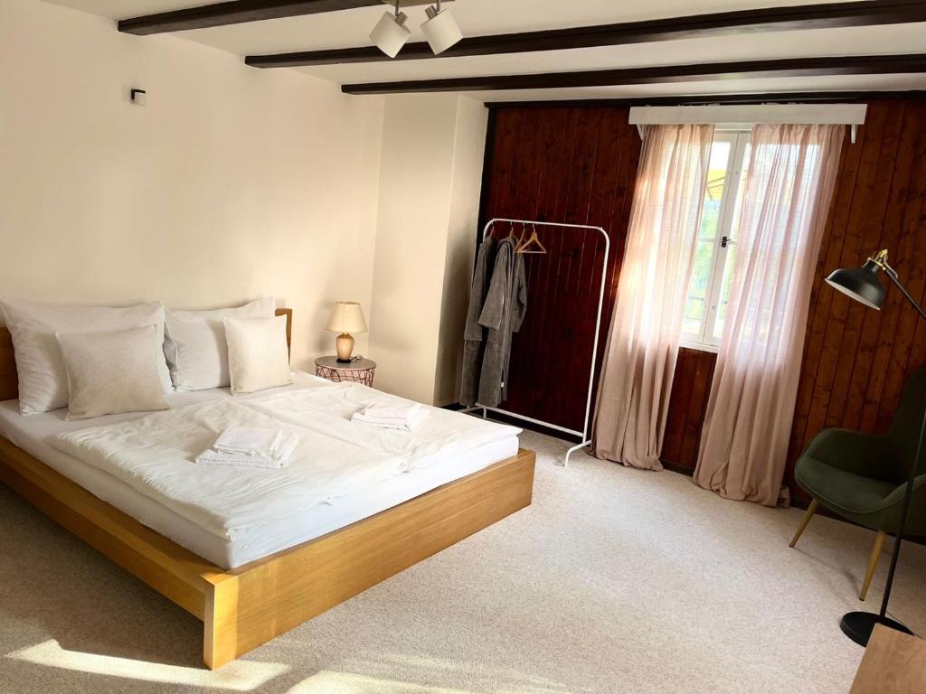Postel nebo postele na pokoji v ubytování B&B Vltavín