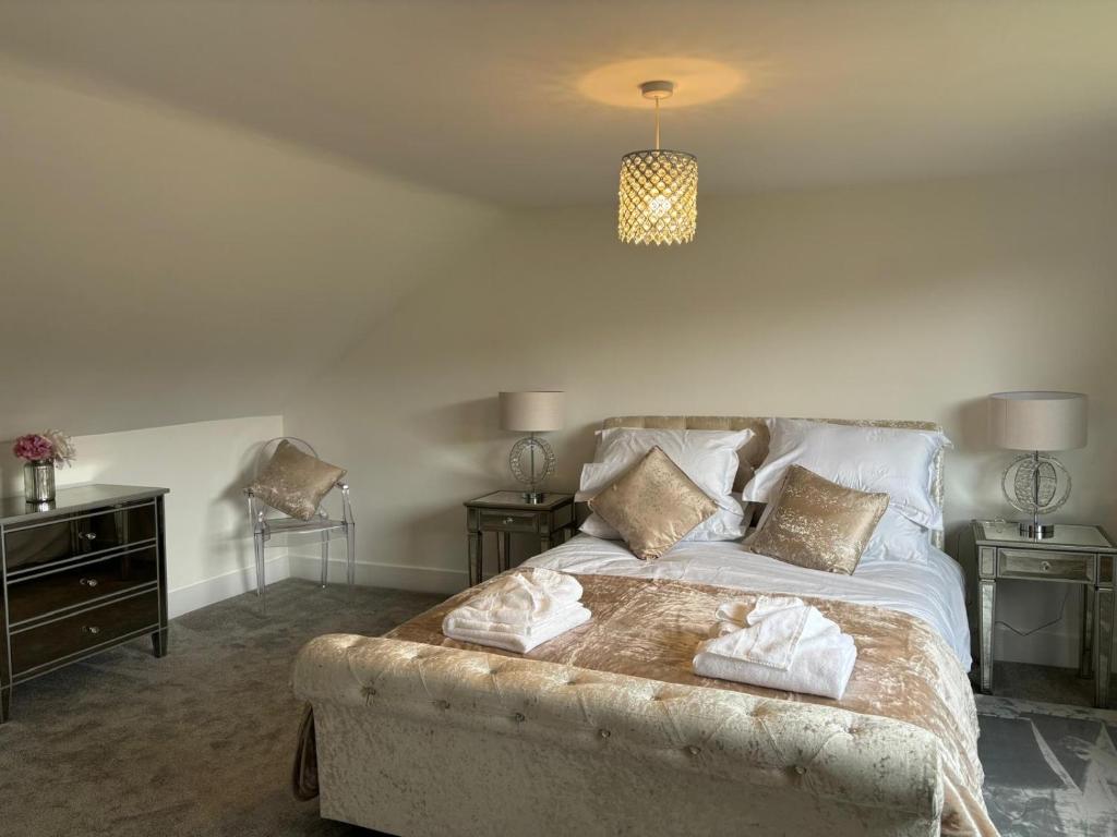 Ένα ή περισσότερα κρεβάτια σε δωμάτιο στο Newly Refurbished Tor View Executive Dormer Bungalow Rossendale