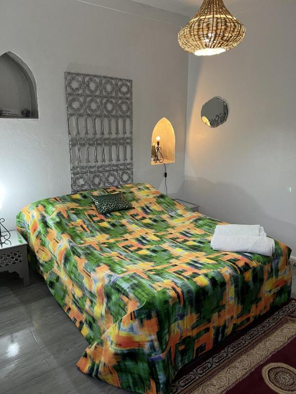 Postelja oz. postelje v sobi nastanitve Riad Le Lieu