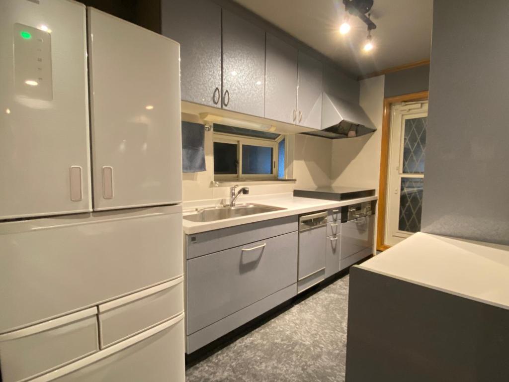 Kuchyň nebo kuchyňský kout v ubytování Five room 120 SKY TREE SENSOJI FreeParking 1292sqft