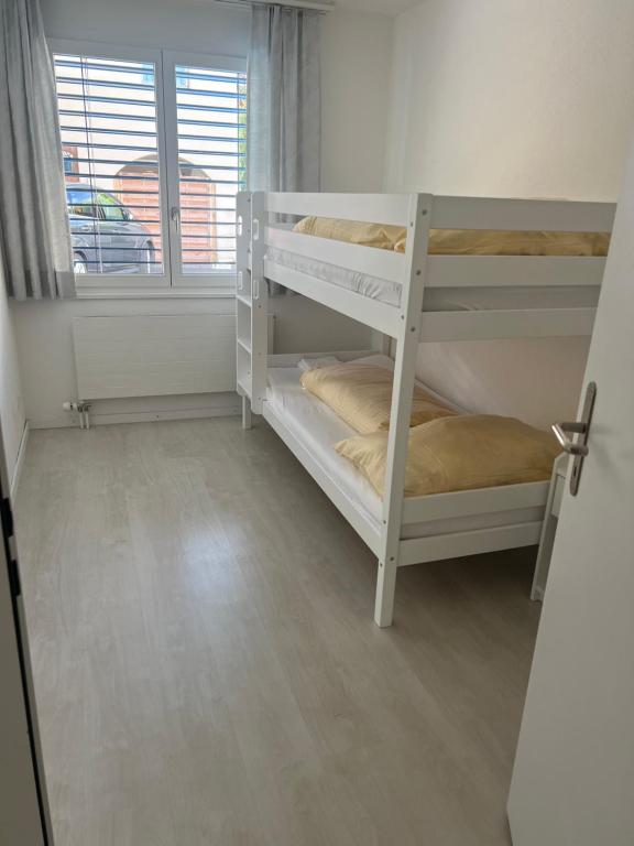 Postel nebo postele na pokoji v ubytování Apartment TOM
