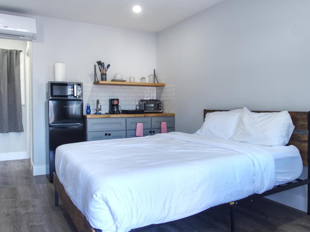 Postel nebo postele na pokoji v ubytování Vermont Suites