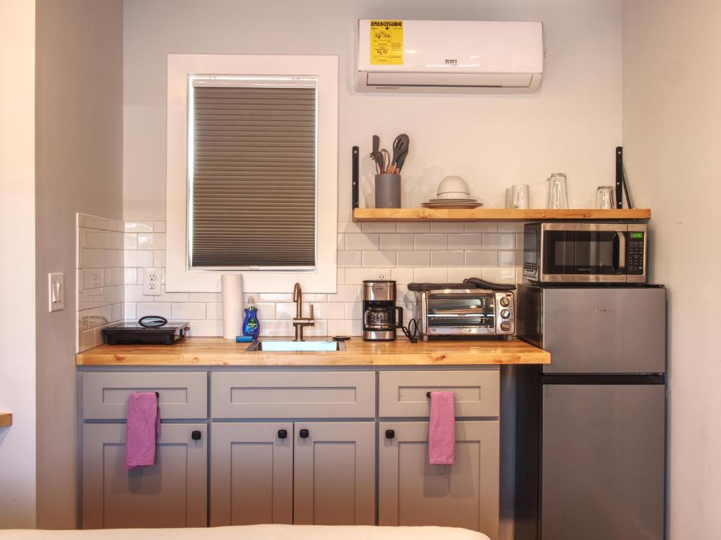 Kuchyň nebo kuchyňský kout v ubytování Vermont Suites