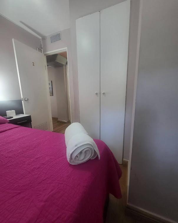 Postel nebo postele na pokoji v ubytování Habitaciones R-1