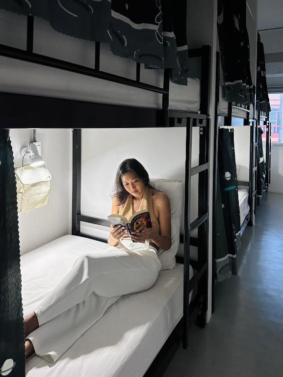Postel nebo postele na pokoji v ubytování Prachan Hostel