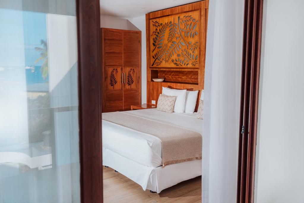 Postel nebo postele na pokoji v ubytování Hotel Acacia