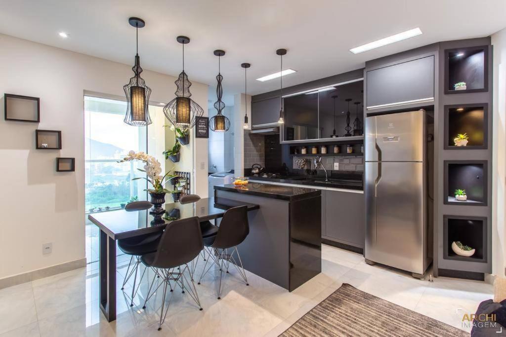 Η κουζίνα ή μικρή κουζίνα στο Apartamento em Itapema