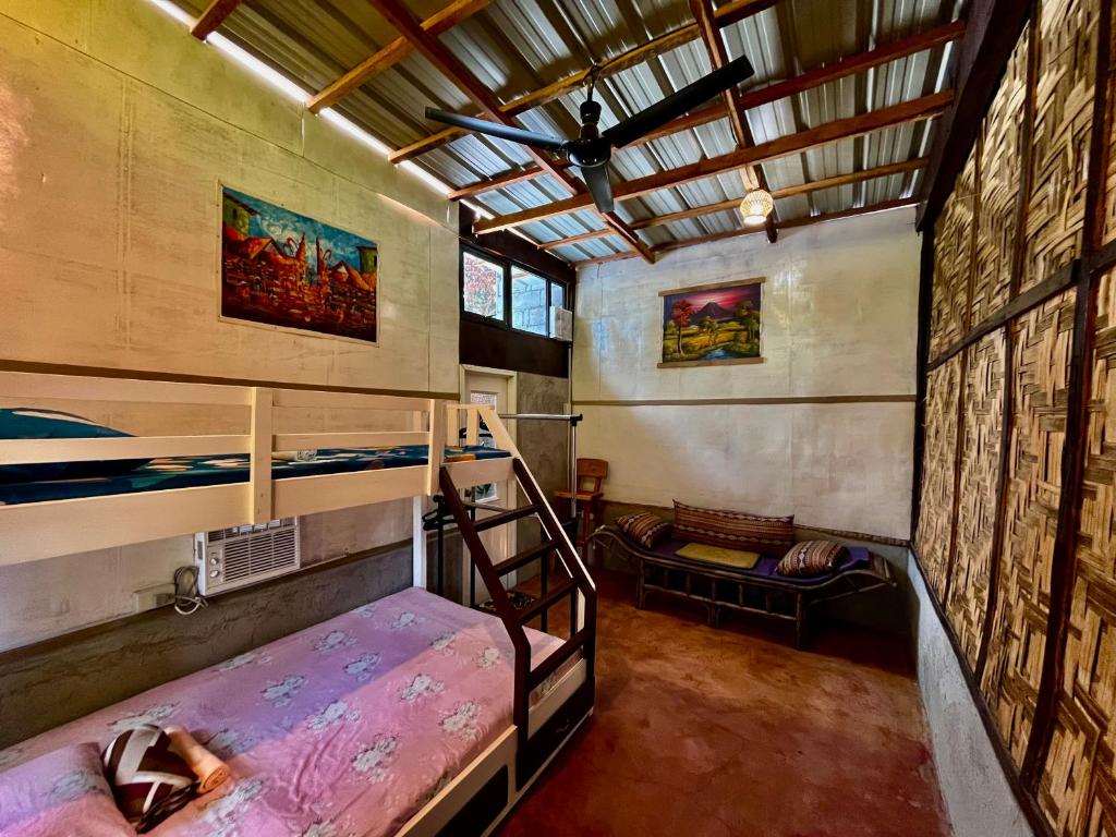 Postel nebo postele na pokoji v ubytování Gensan Hostel