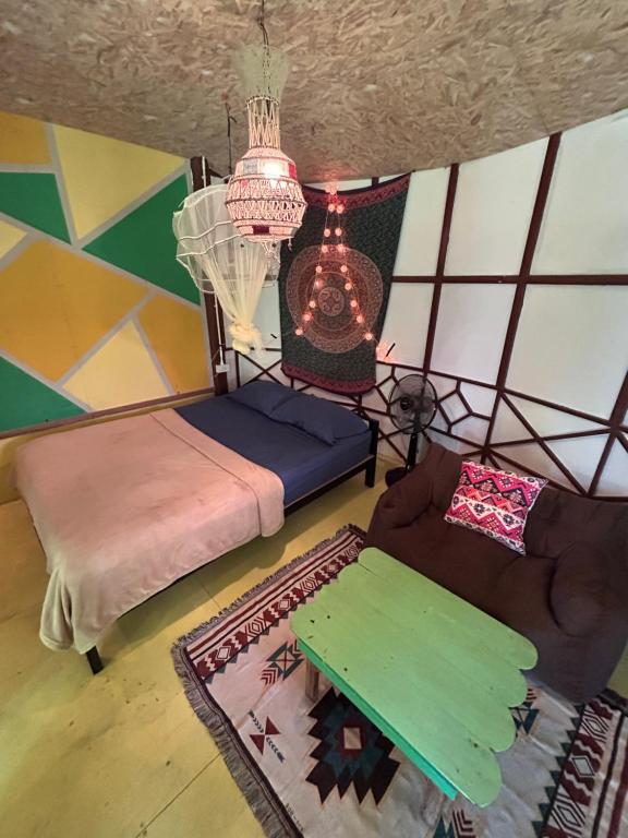 Postel nebo postele na pokoji v ubytování Hippy Hut Koh Chang