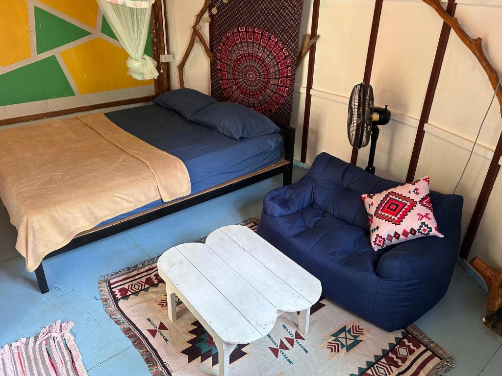 Postel nebo postele na pokoji v ubytování Hippy Hut Koh Chang