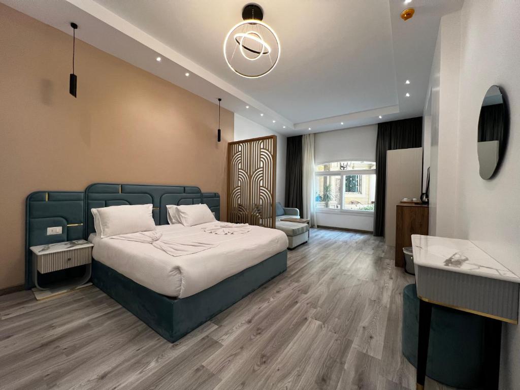 Postel nebo postele na pokoji v ubytování Onyx Pyramids Boutique Hotel