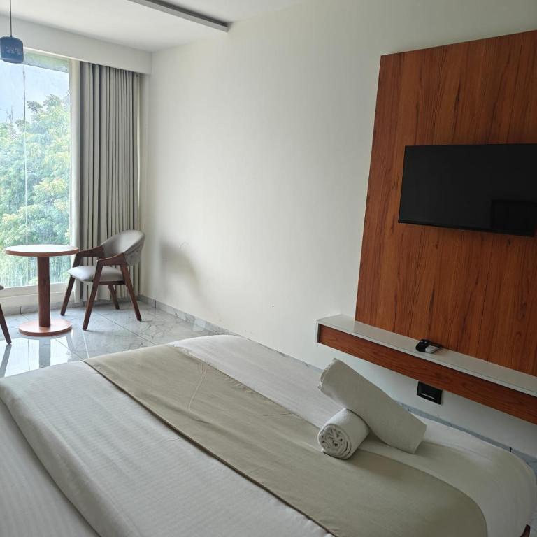 Postel nebo postele na pokoji v ubytování Hotelmaple tree