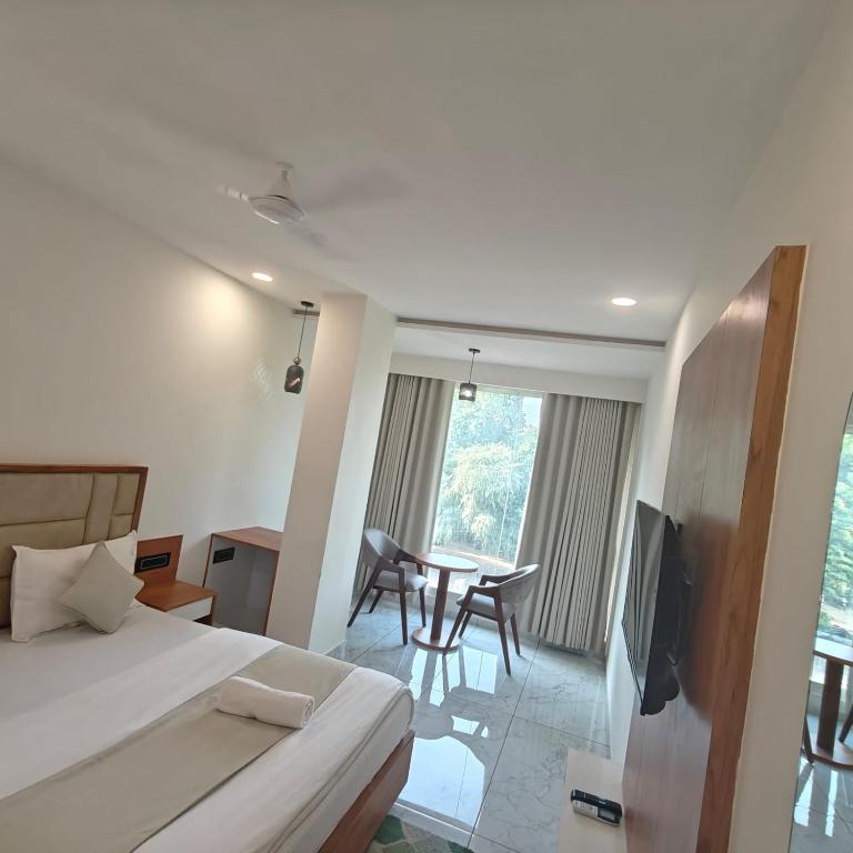 Postel nebo postele na pokoji v ubytování Hotelmaple tree