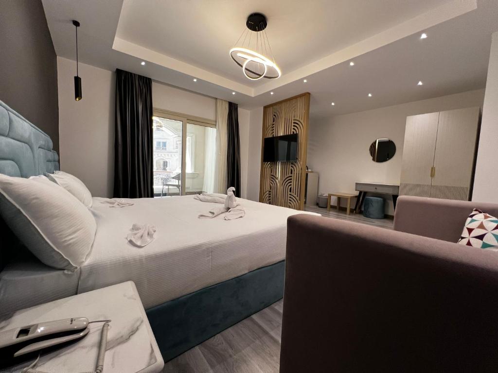 Postel nebo postele na pokoji v ubytování Onyx Pyramids Boutique Hotel