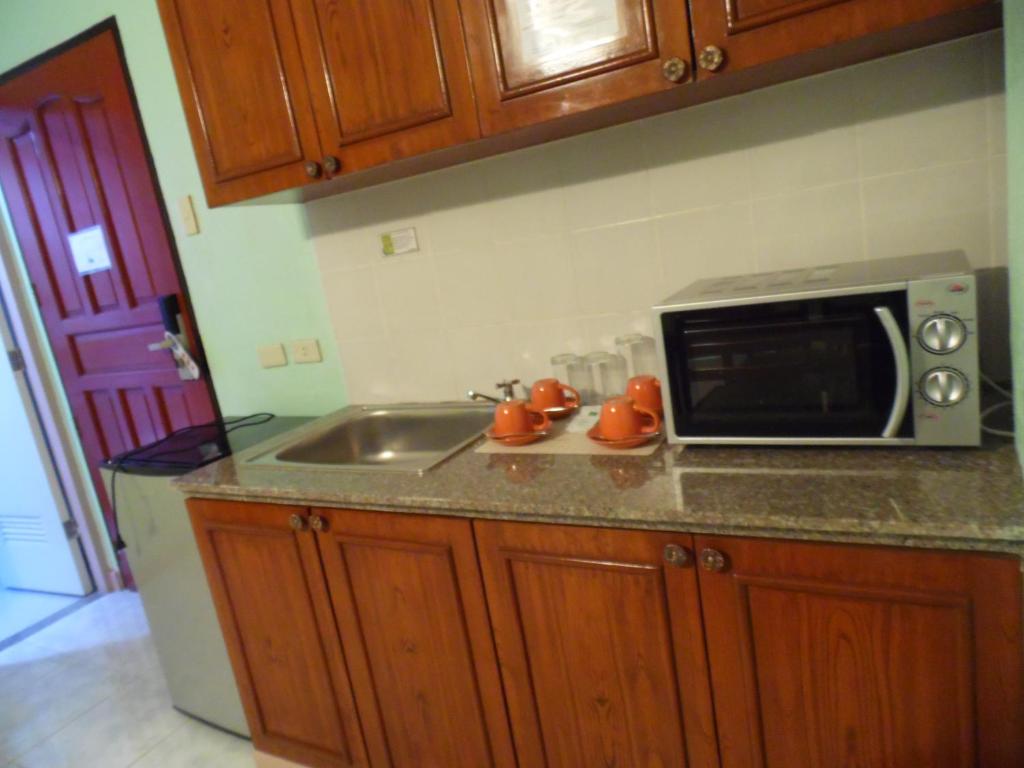 Kuchyň nebo kuchyňský kout v ubytování Albergo Hotel