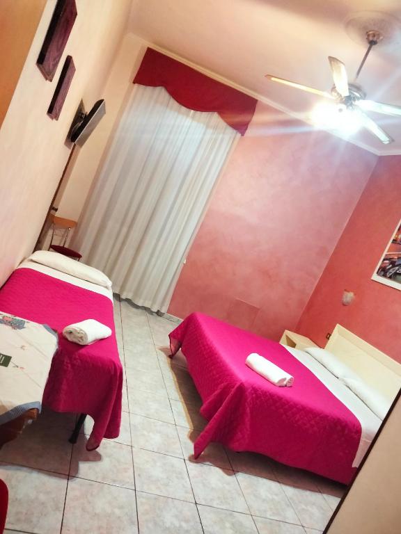 Postel nebo postele na pokoji v ubytování Hotel PRINCIPE AMEDEO