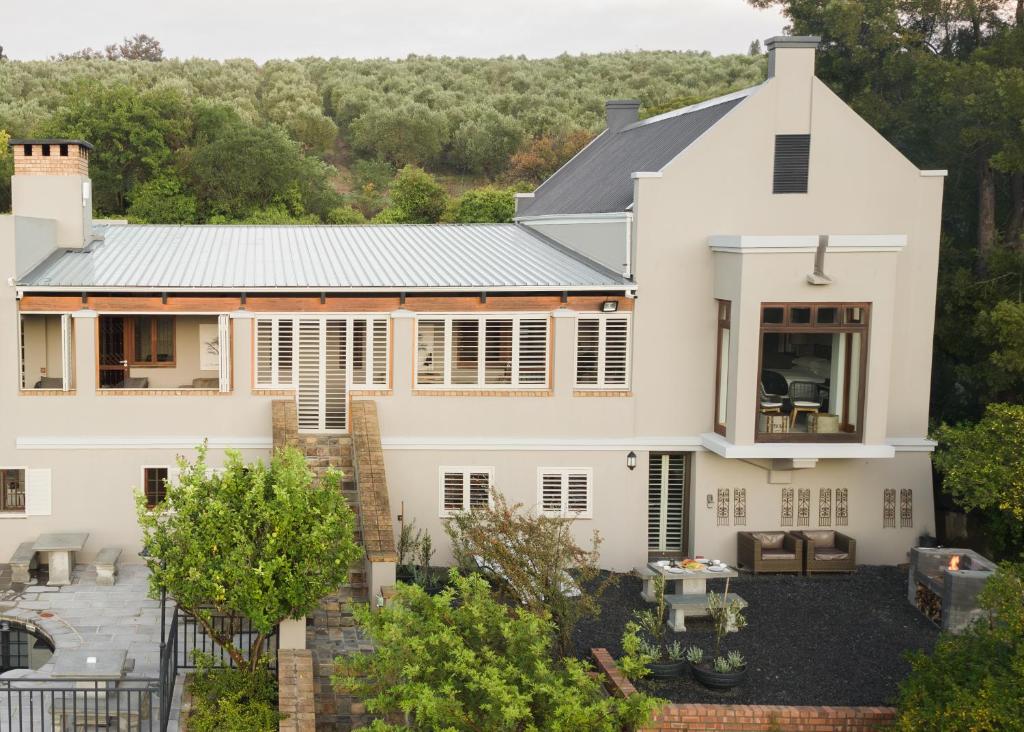 an aerial view of a white house at Avemore Hidden Haven Le Verger in Stellenbosch
