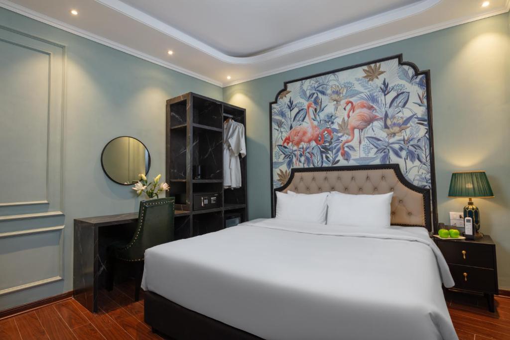 Postel nebo postele na pokoji v ubytování Madelise Grand Hotel