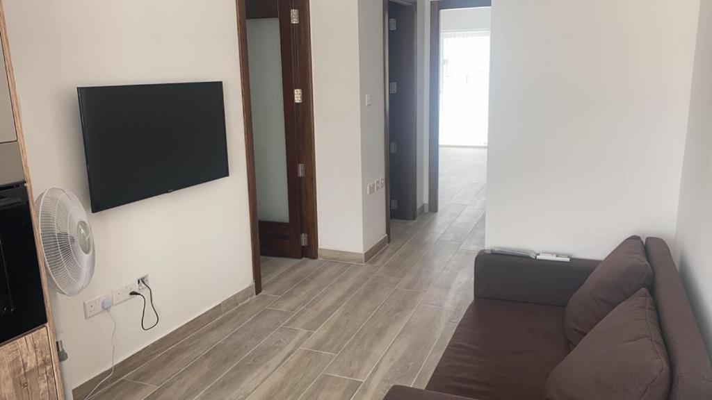 TV a/nebo společenská místnost v ubytování Bright and Convenient Penthouse in Central Malta