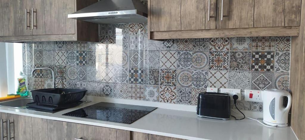 Kuchyň nebo kuchyňský kout v ubytování Bright and Convenient Penthouse in Central Malta