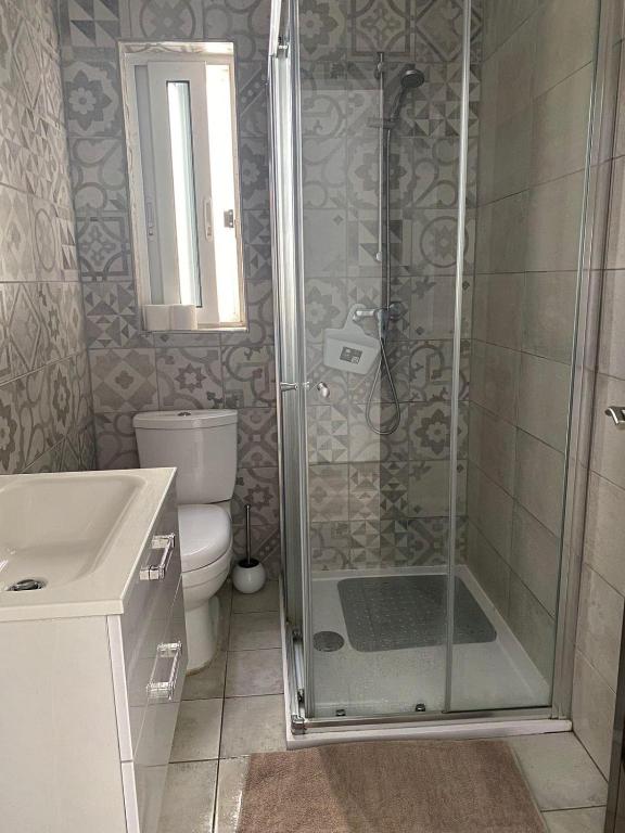 Koupelna v ubytování Bright and Convenient Penthouse in Central Malta