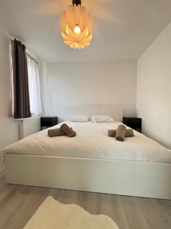 Postel nebo postele na pokoji v ubytování Moderne Villa aux portes de Bruxelles!