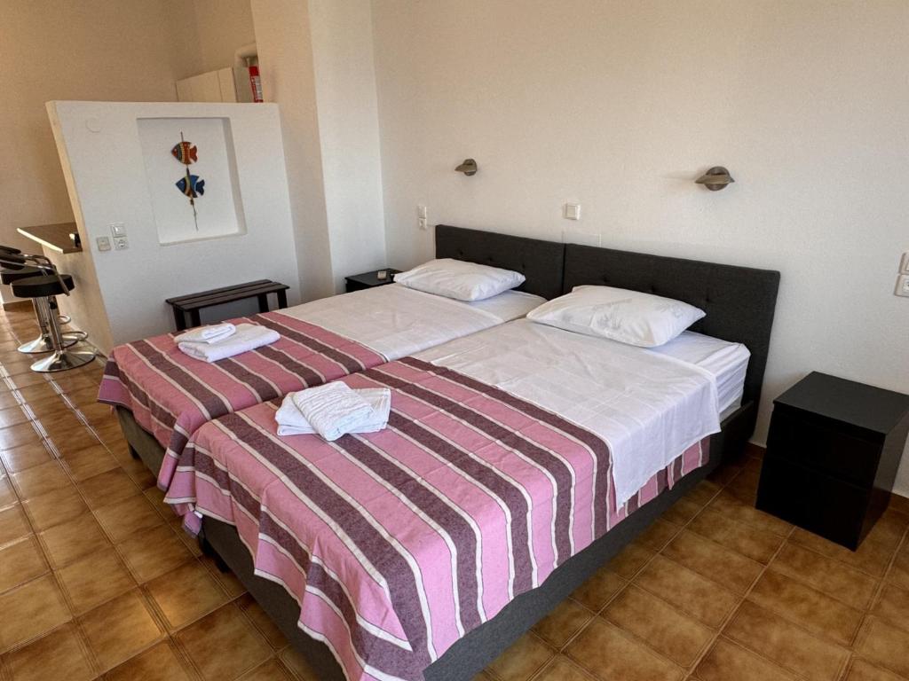 Posteľ alebo postele v izbe v ubytovaní Katerina Charming Place
