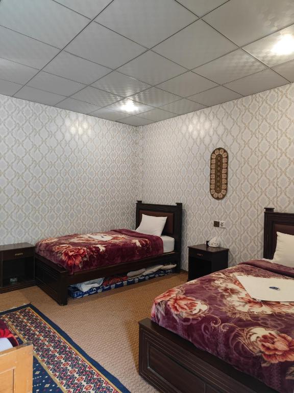 Postel nebo postele na pokoji v ubytování Passu Cones Hotel