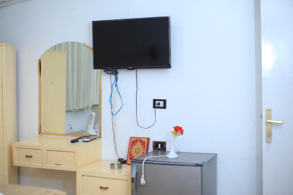TV a/nebo společenská místnost v ubytování Oscar Hotel