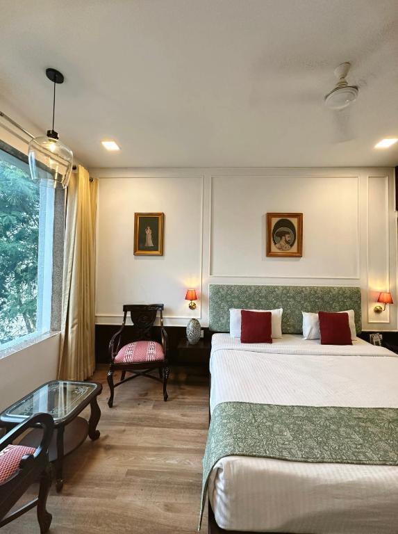 Postel nebo postele na pokoji v ubytování Hotel Atulyaa Taj