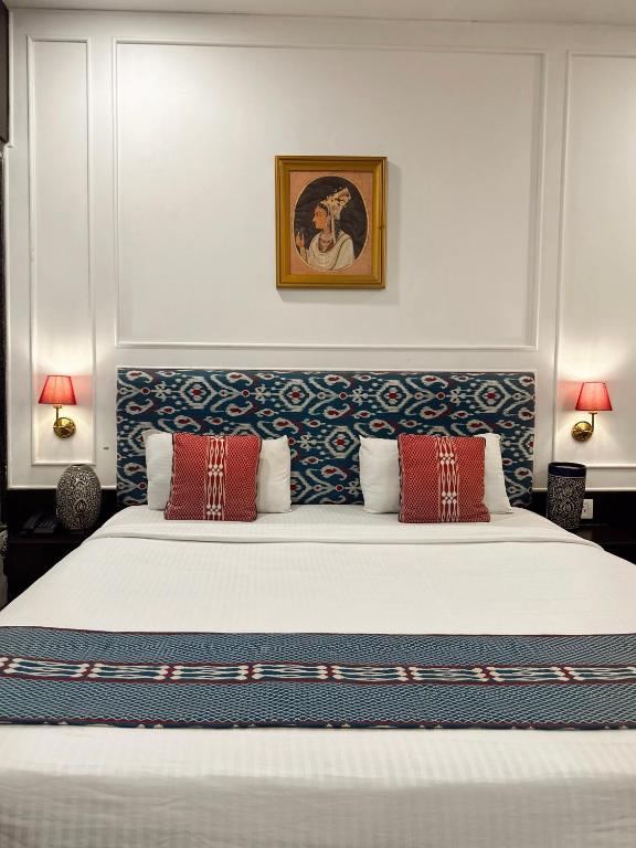 Postel nebo postele na pokoji v ubytování Hotel Atulyaa Taj