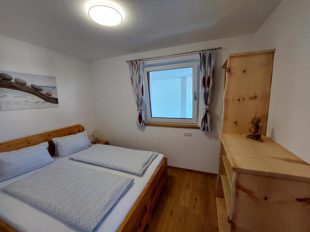 Posteľ alebo postele v izbe v ubytovaní Ferienwohnung Gstreinthaler