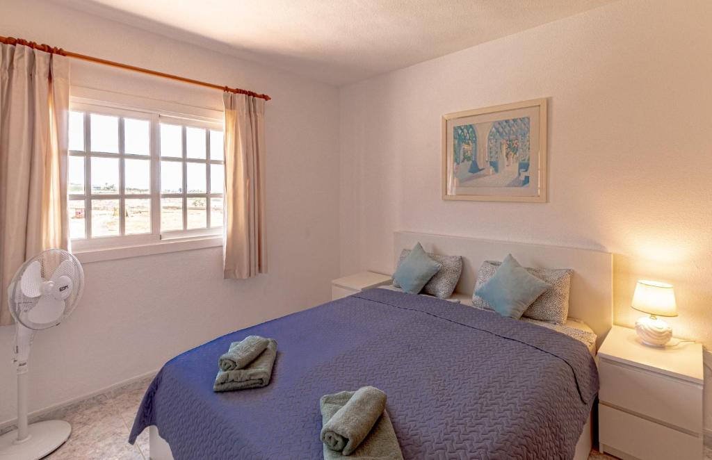 Posteľ alebo postele v izbe v ubytovaní Ocean View Penthouse By Dream Homes Tenerife