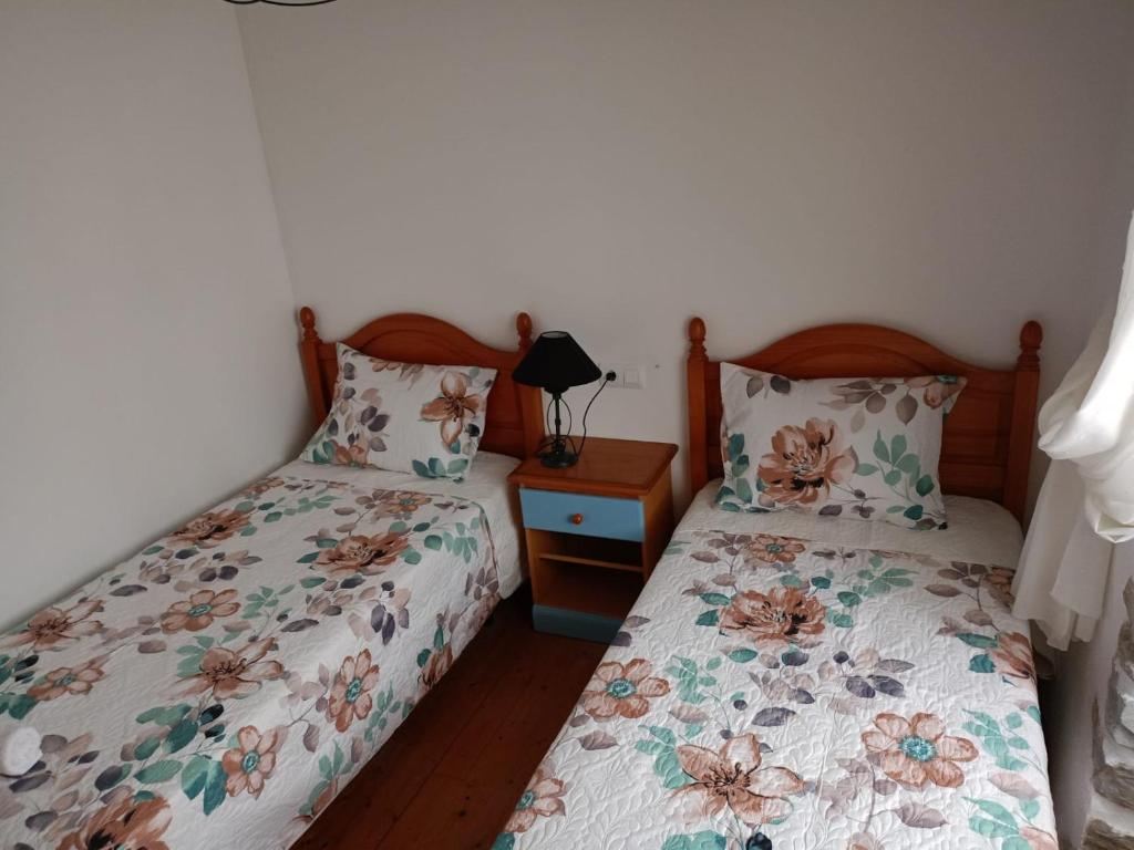 Postel nebo postele na pokoji v ubytování Hostal del Camino de Santiago