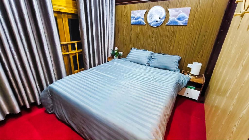 Postel nebo postele na pokoji v ubytování Sapa Garden Hostel