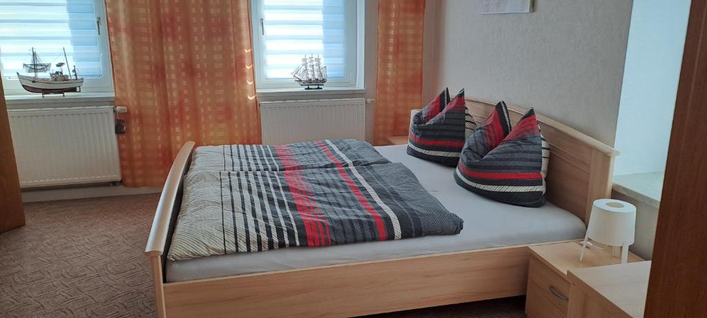 Postel nebo postele na pokoji v ubytování Am Forellenteich