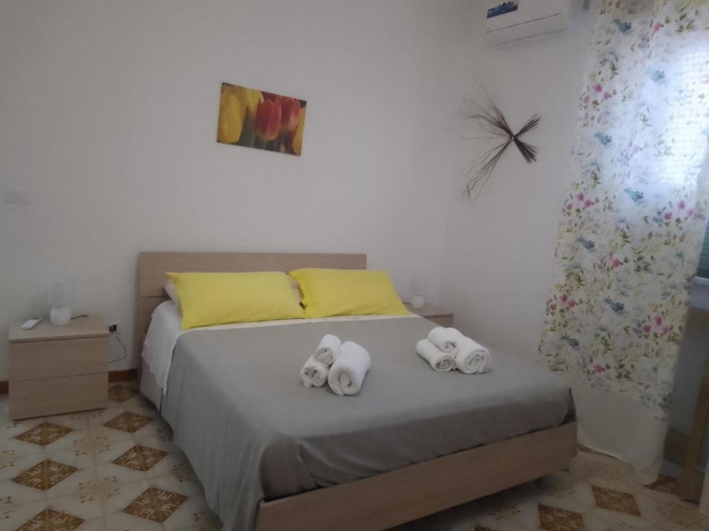 Postel nebo postele na pokoji v ubytování Carpe Diem da Salvina