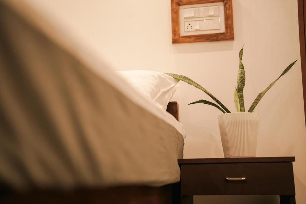 Postel nebo postele na pokoji v ubytování Marari Bobans villa
