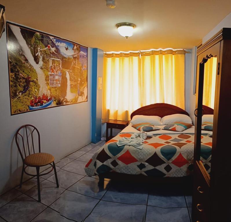 Postel nebo postele na pokoji v ubytování Hostal mariajose baños