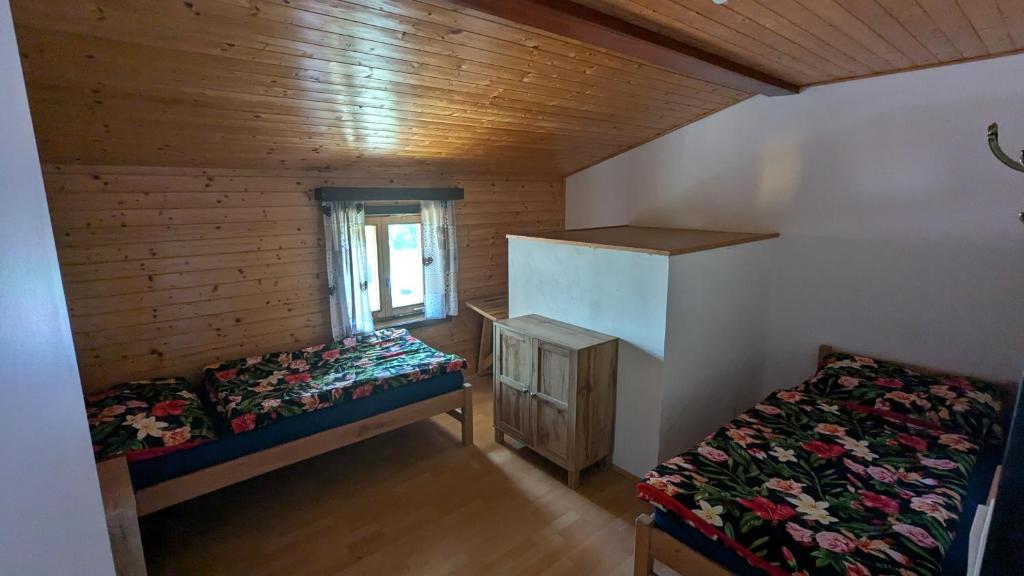 Postel nebo postele na pokoji v ubytování U Kodrů