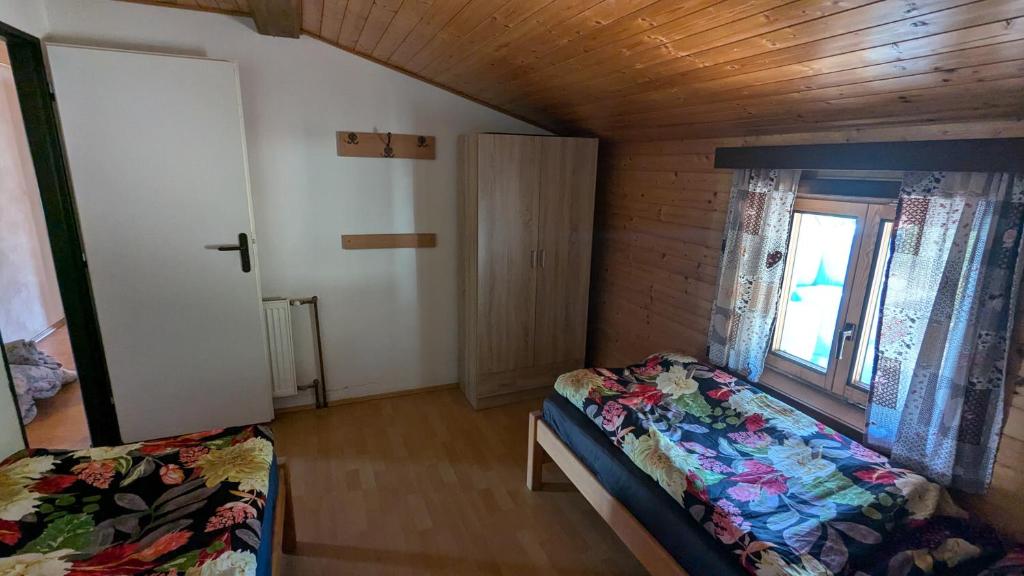 Postel nebo postele na pokoji v ubytování U Kodrů