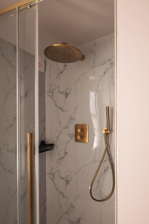 Koupelna v ubytování Zurenborg Suites