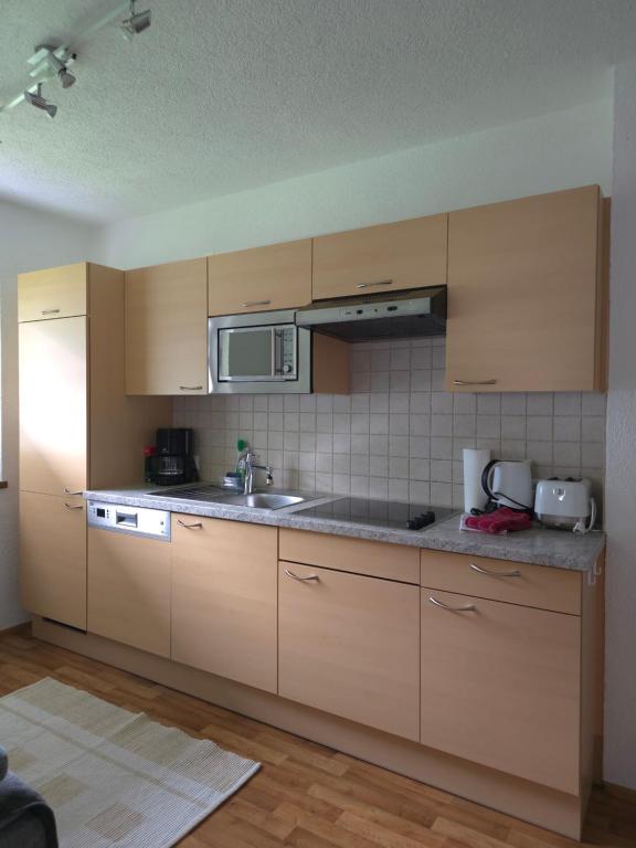 Kuchyň nebo kuchyňský kout v ubytování Apart Tyrolis