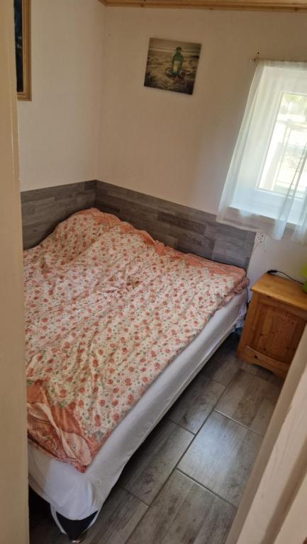 Postel nebo postele na pokoji v ubytování Sárközi Nyaraló
