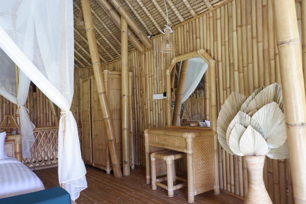 Postel nebo postele na pokoji v ubytování Pitu, a Punggul Village Escape