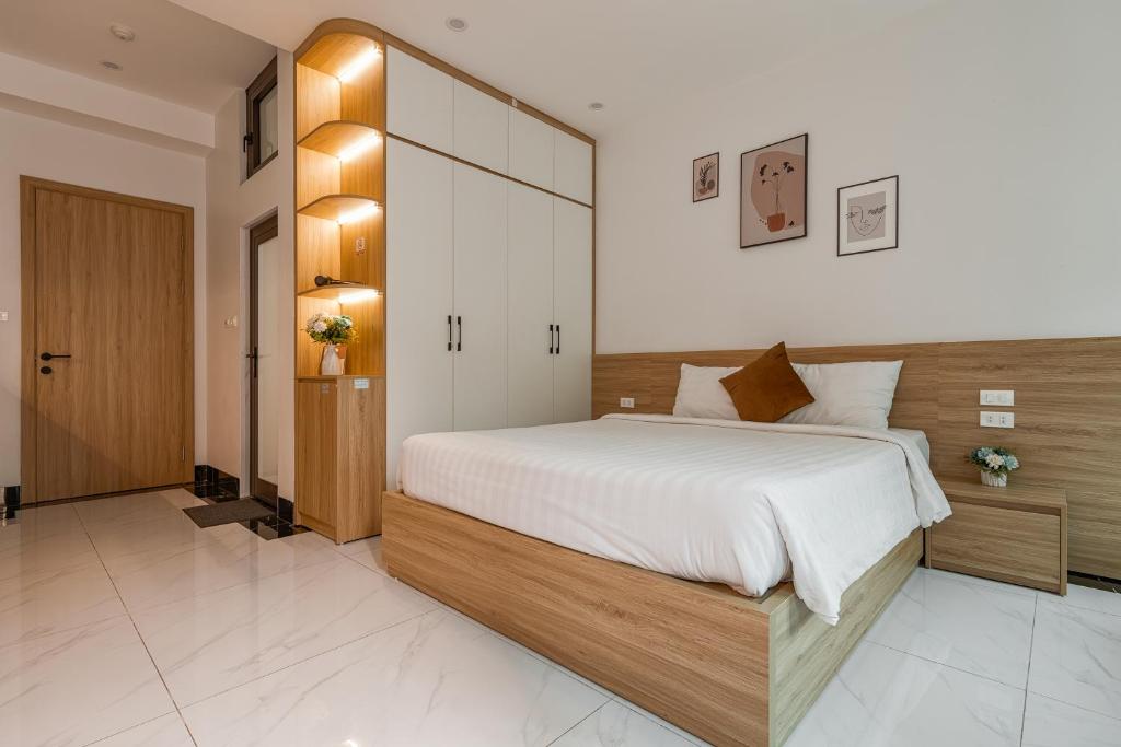 Postel nebo postele na pokoji v ubytování Dodo home AC