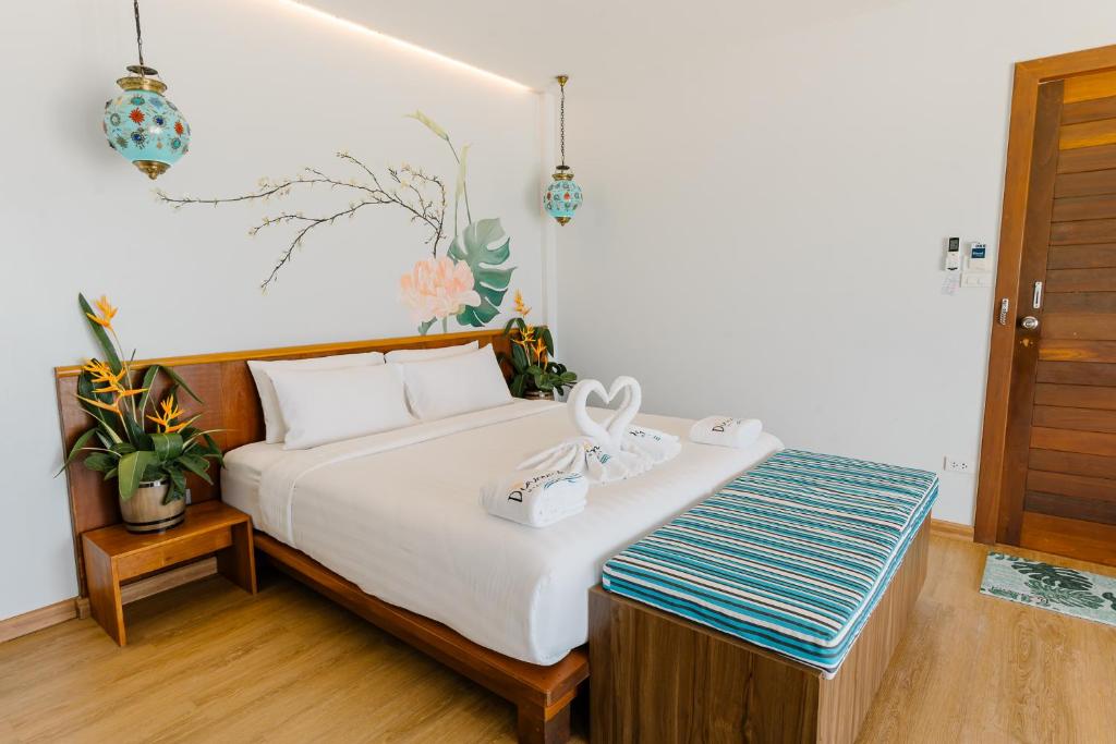 Voodi või voodid majutusasutuse Diamond Beach Resort toas