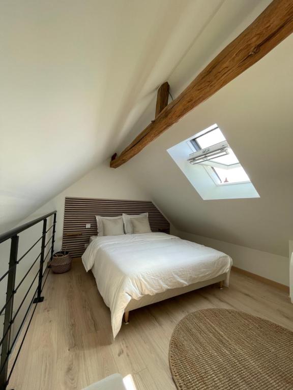 Postel nebo postele na pokoji v ubytování Duplex au cœur de Châteauroux