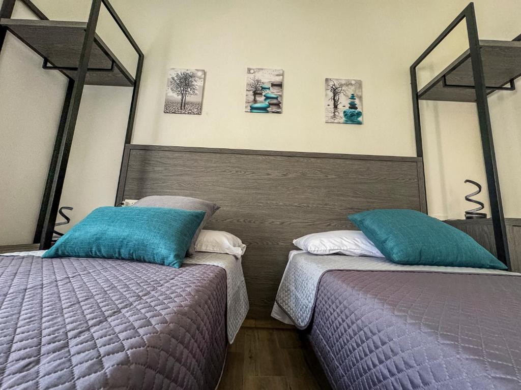 Postel nebo postele na pokoji v ubytování Urban 55