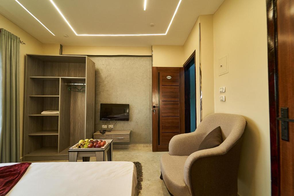 TV a/nebo společenská místnost v ubytování New pyramids inn